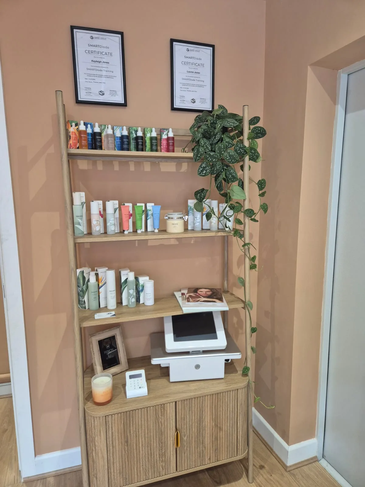 Skincare products and certificates on display at Peaches Laser Clinic Hull
