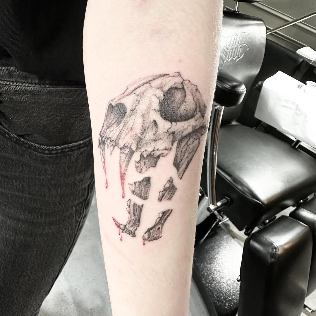 Hyena skull tattoo by Markings Tattoos