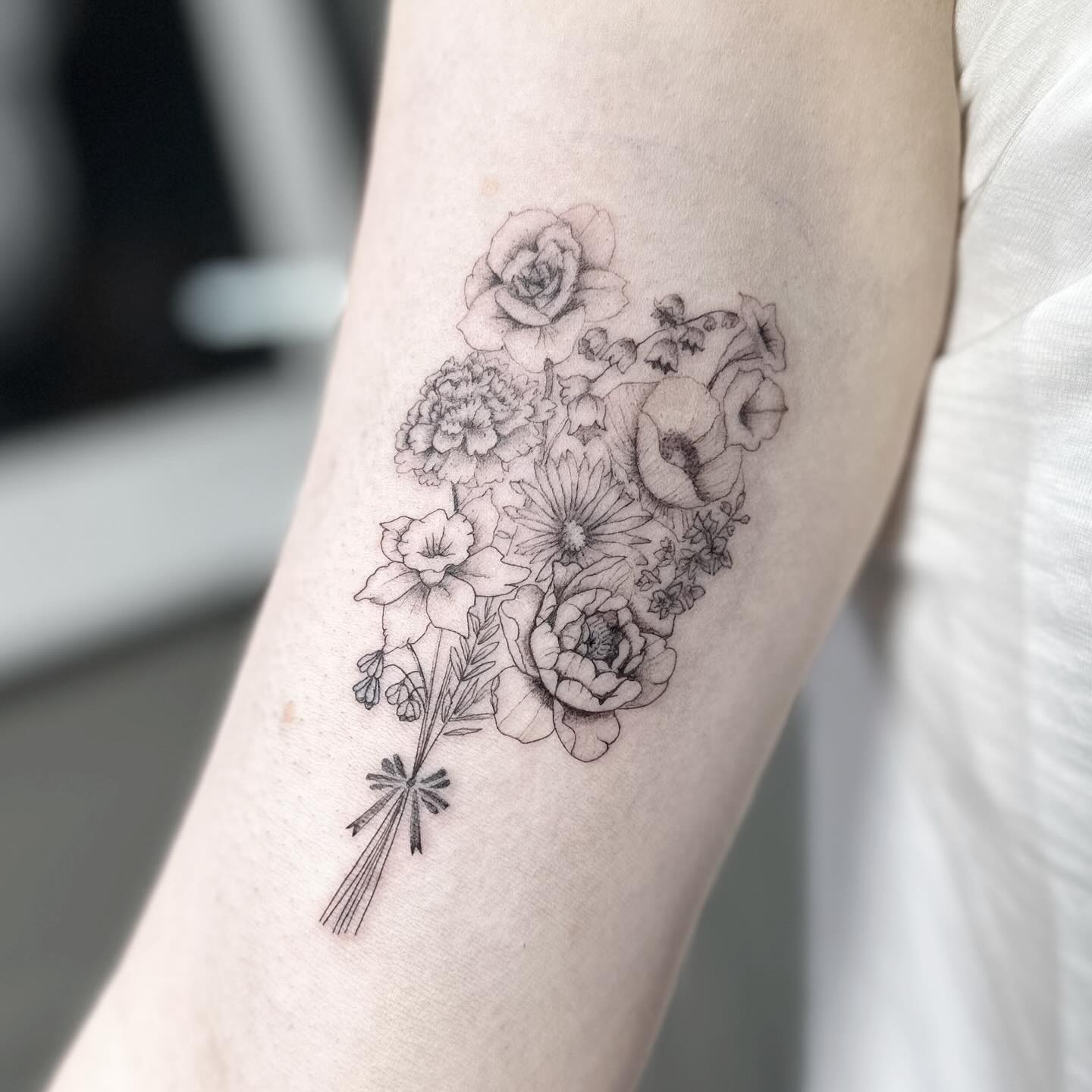 Birth flowers tattoo by Markings Tattoos