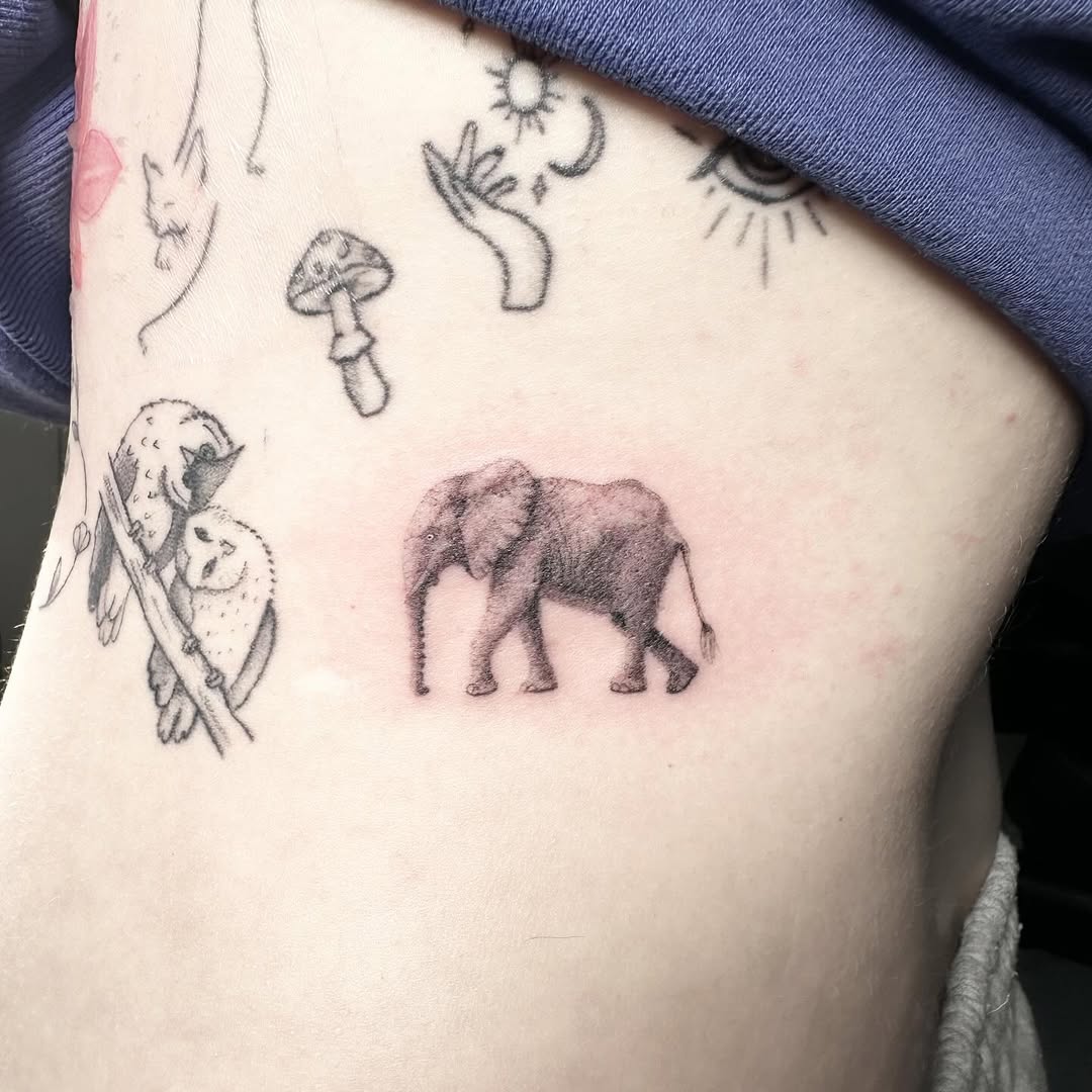 Miniature elephant tattoo by Markings Tattoos Hessle