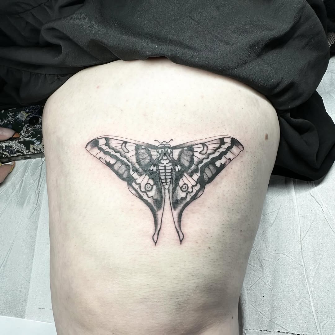 Death moth tattoo by Markings Tattoos