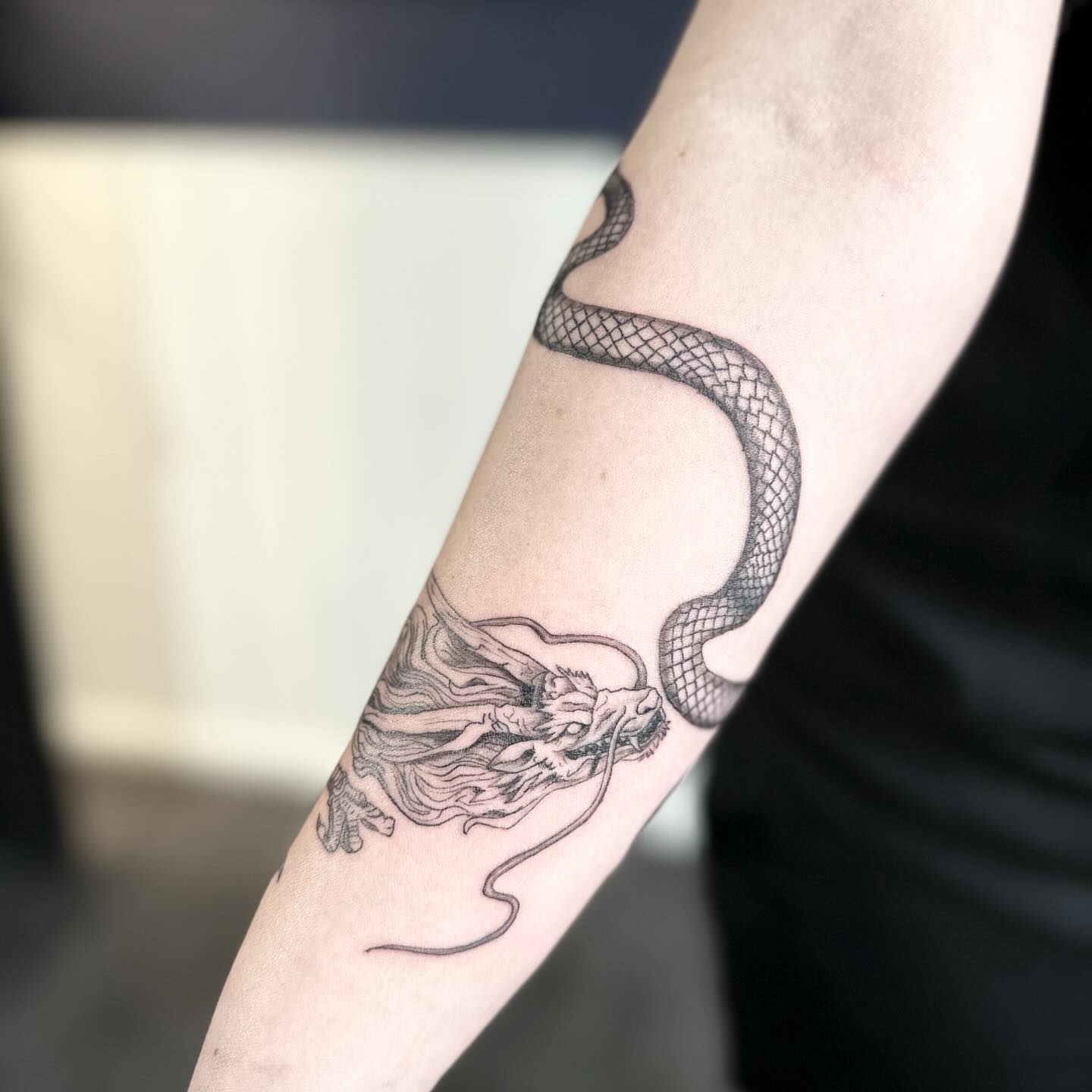 Chinese dragon tattoo by Markings Tattoos