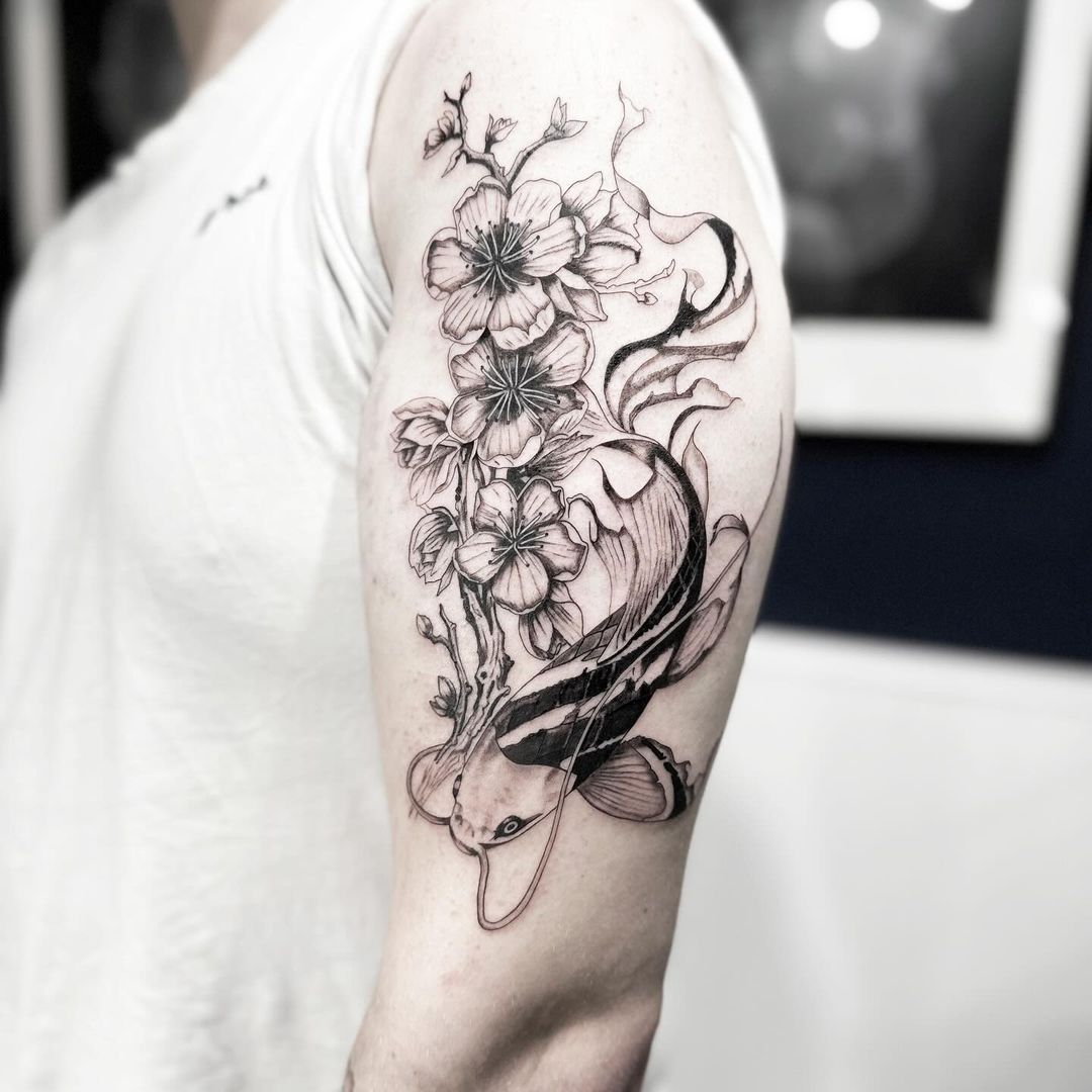 Koi and cherry blossom tattoo by Markings Tattoos