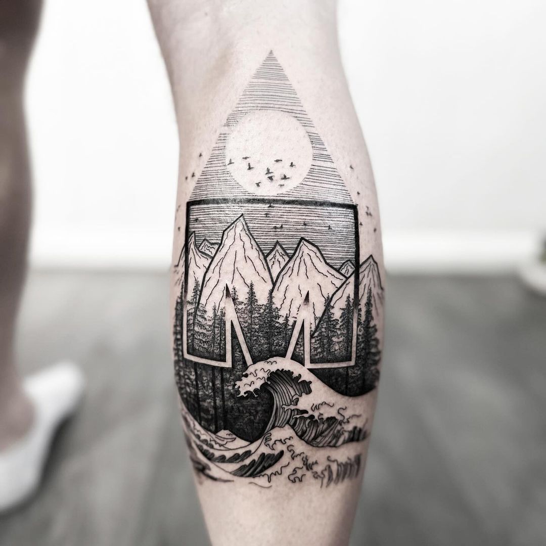 Ironman triathlon tattoo by Markings Tattoos