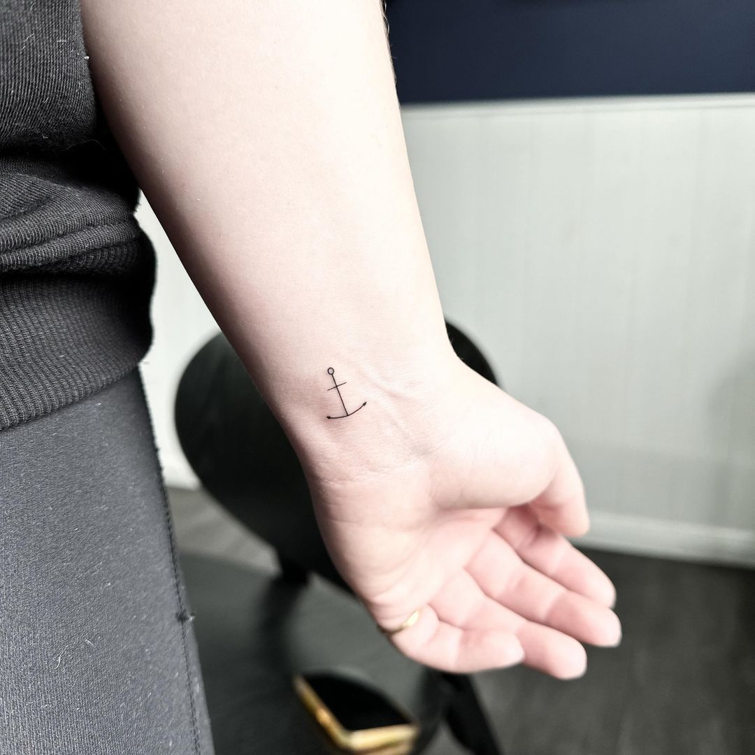 Single needle anchor tattoo by Markings Tattoos