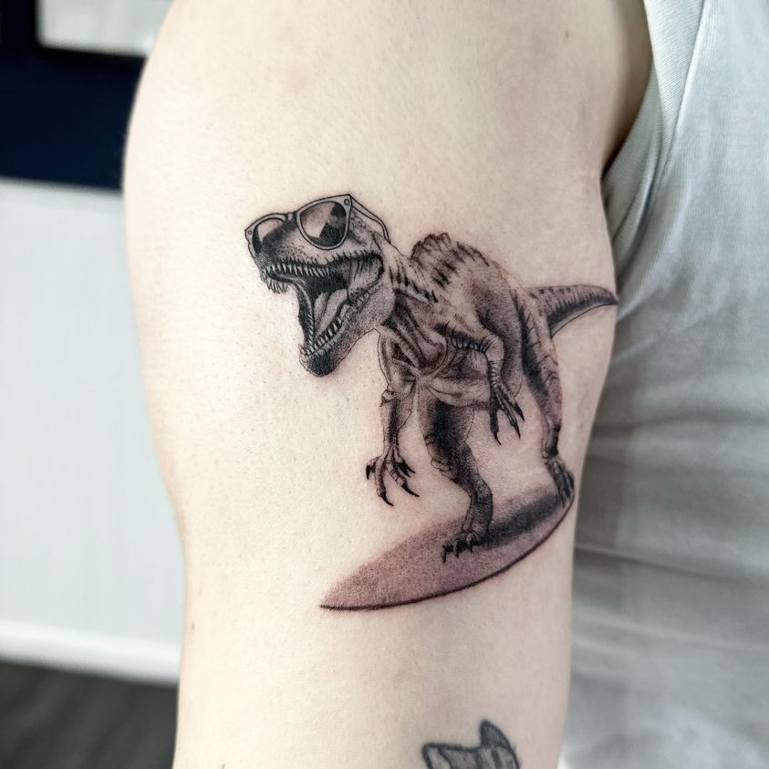 T-Rex surfing tattoo by Markings Tattoos