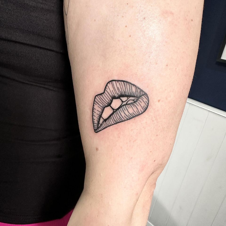 Andy Warhol pop art lips tattoo by Markings Tattoos
