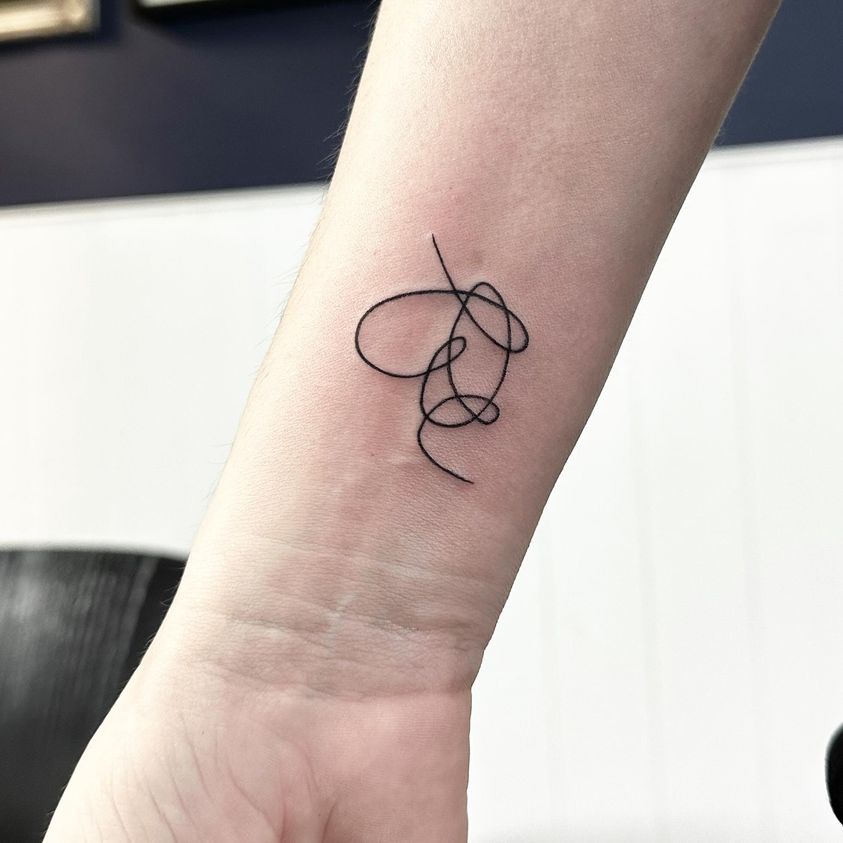 Continuous line heart tattoo by Markings Tattoos